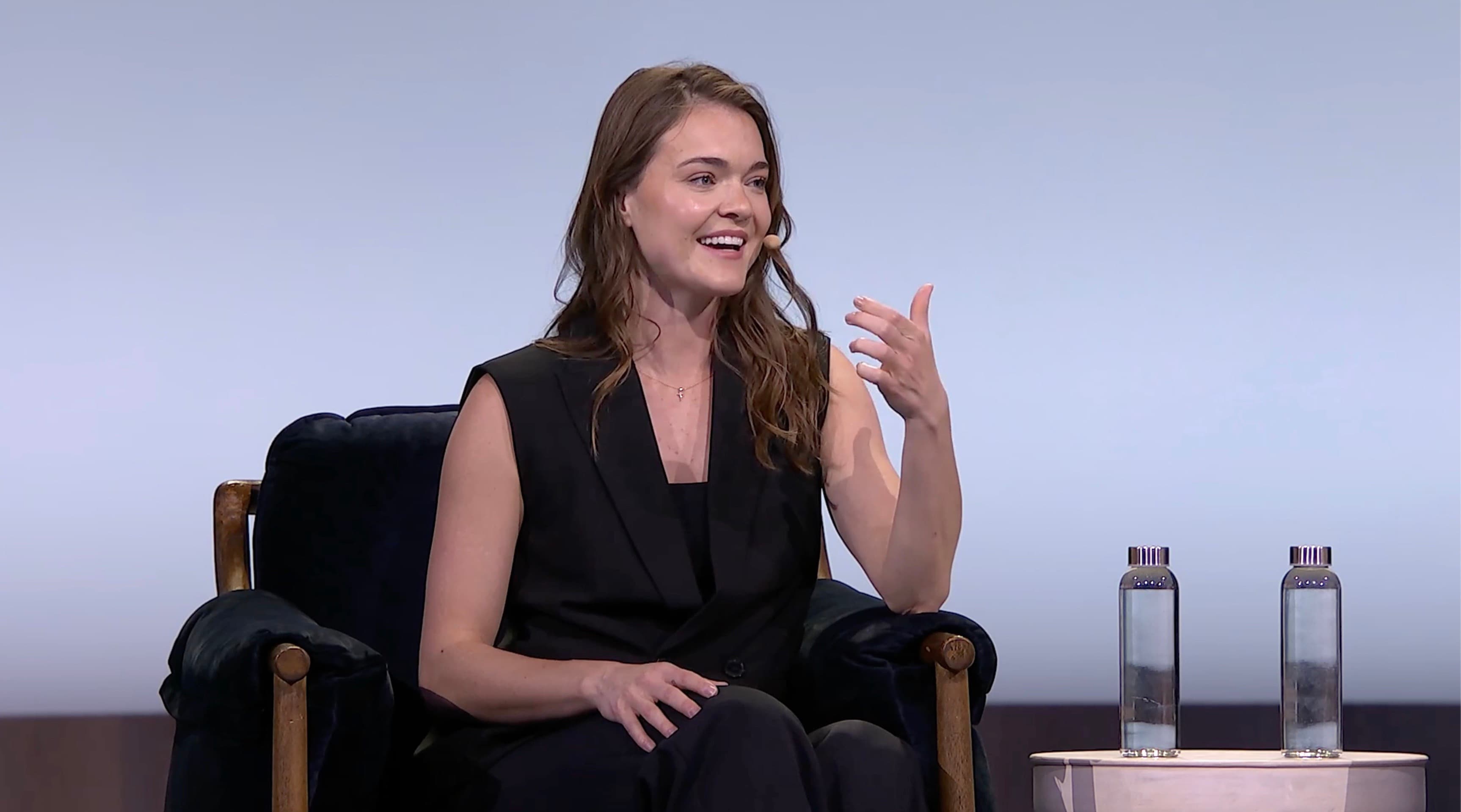 Harper Carroll speaking on stage